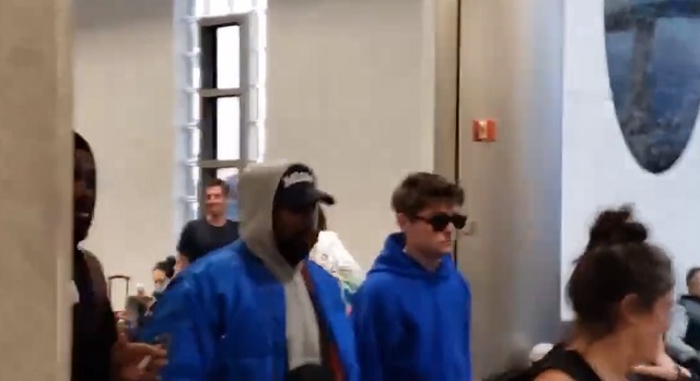 Kanye 'Ye' West Filmed Walking Through Miami Airport With Nick Fuentes 'On Way to Meet Trump at Mar-a-Lago'